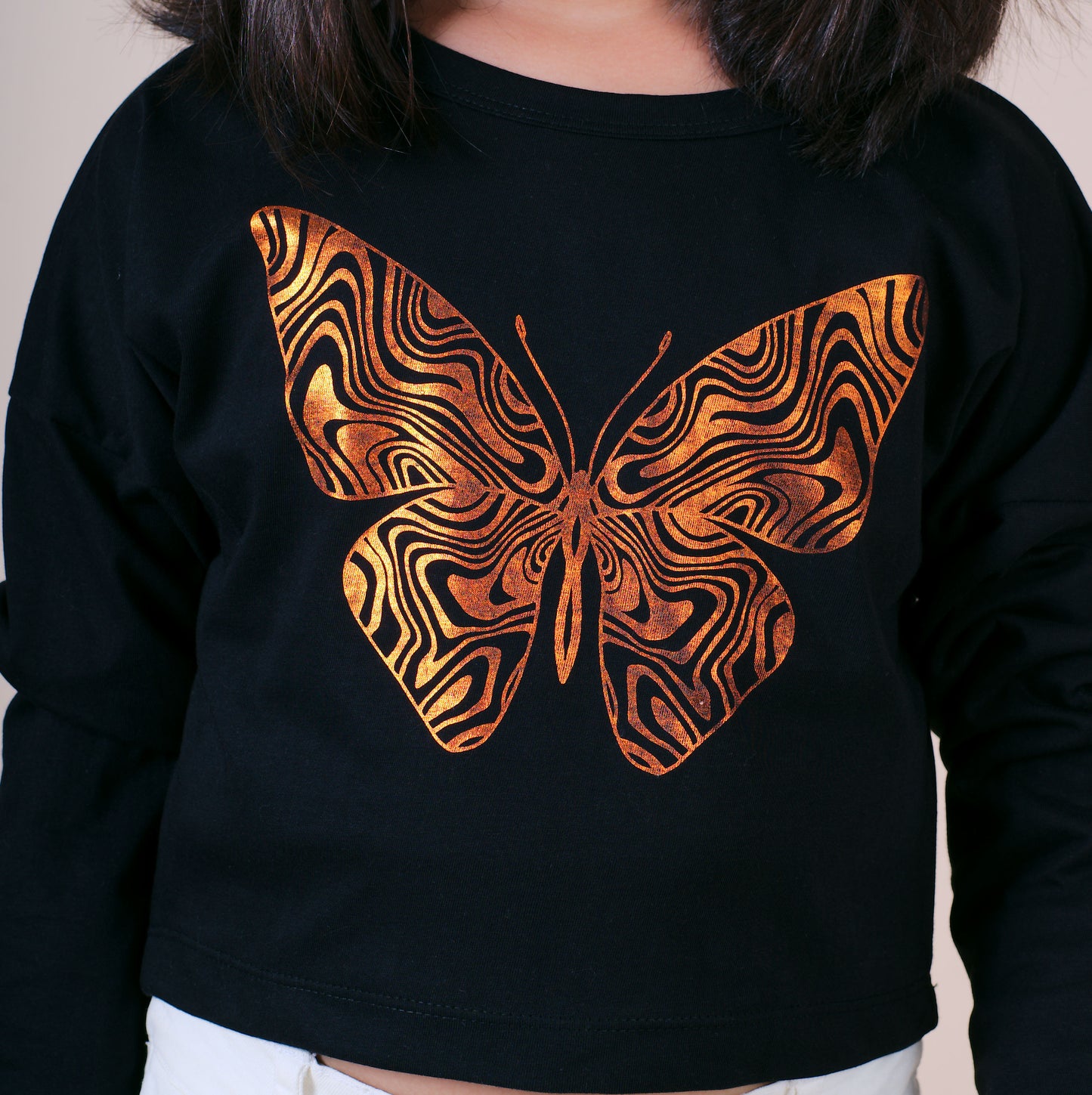 Little Carrot Black T-Shirt with a large Foiil Print butterfly design on a plain background