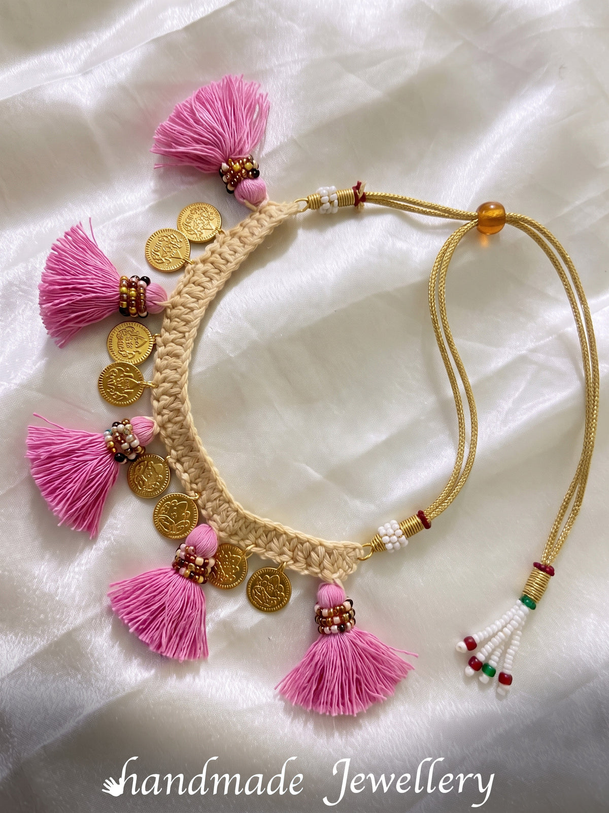 A flat shoot of Little Carrot handmade corchet necklace