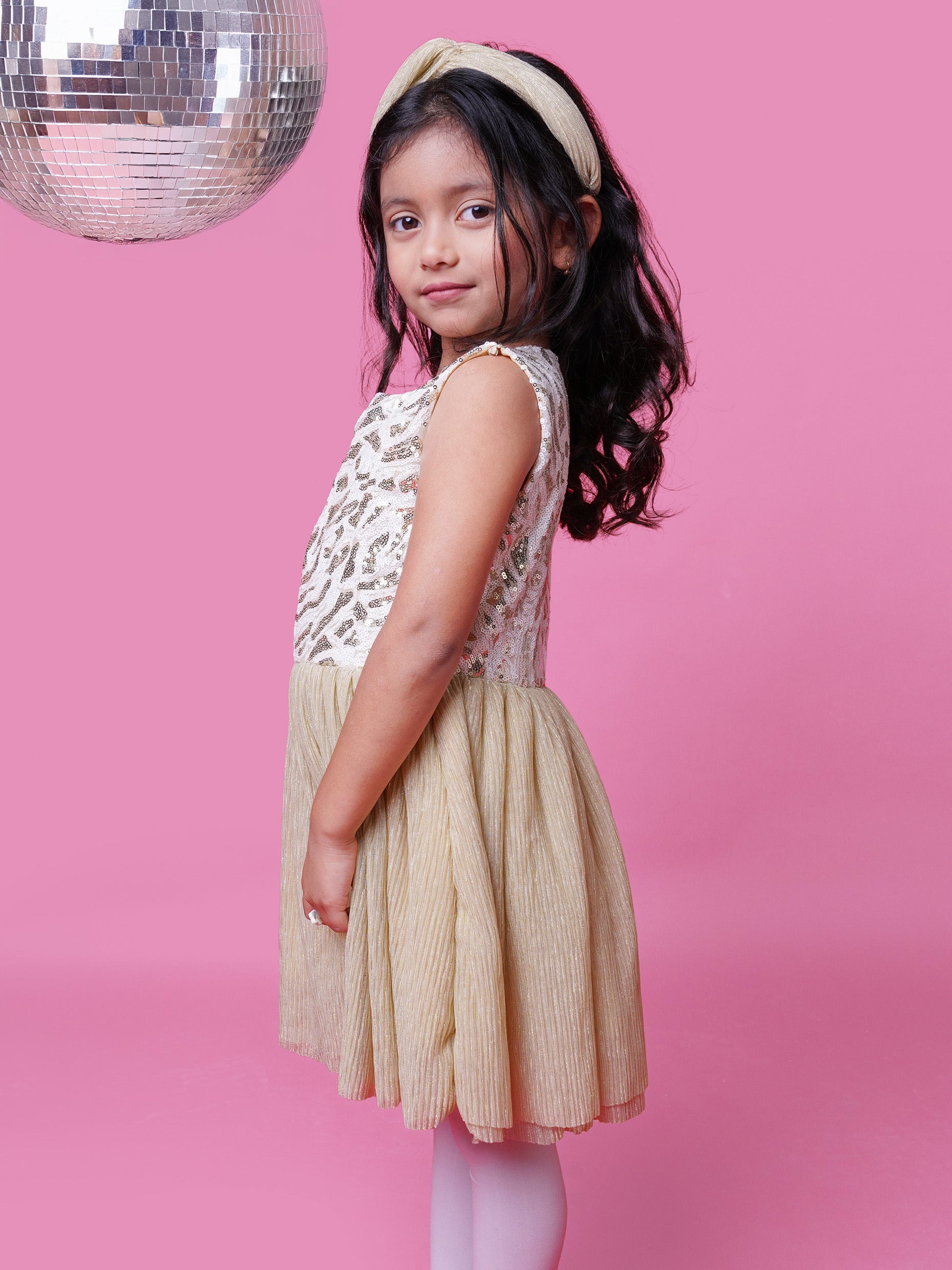 Golden sequin fit and flare birthday dress for girls with sleeveless design, glittery net flare, and back zipper – perfect for special occasions and celebrations