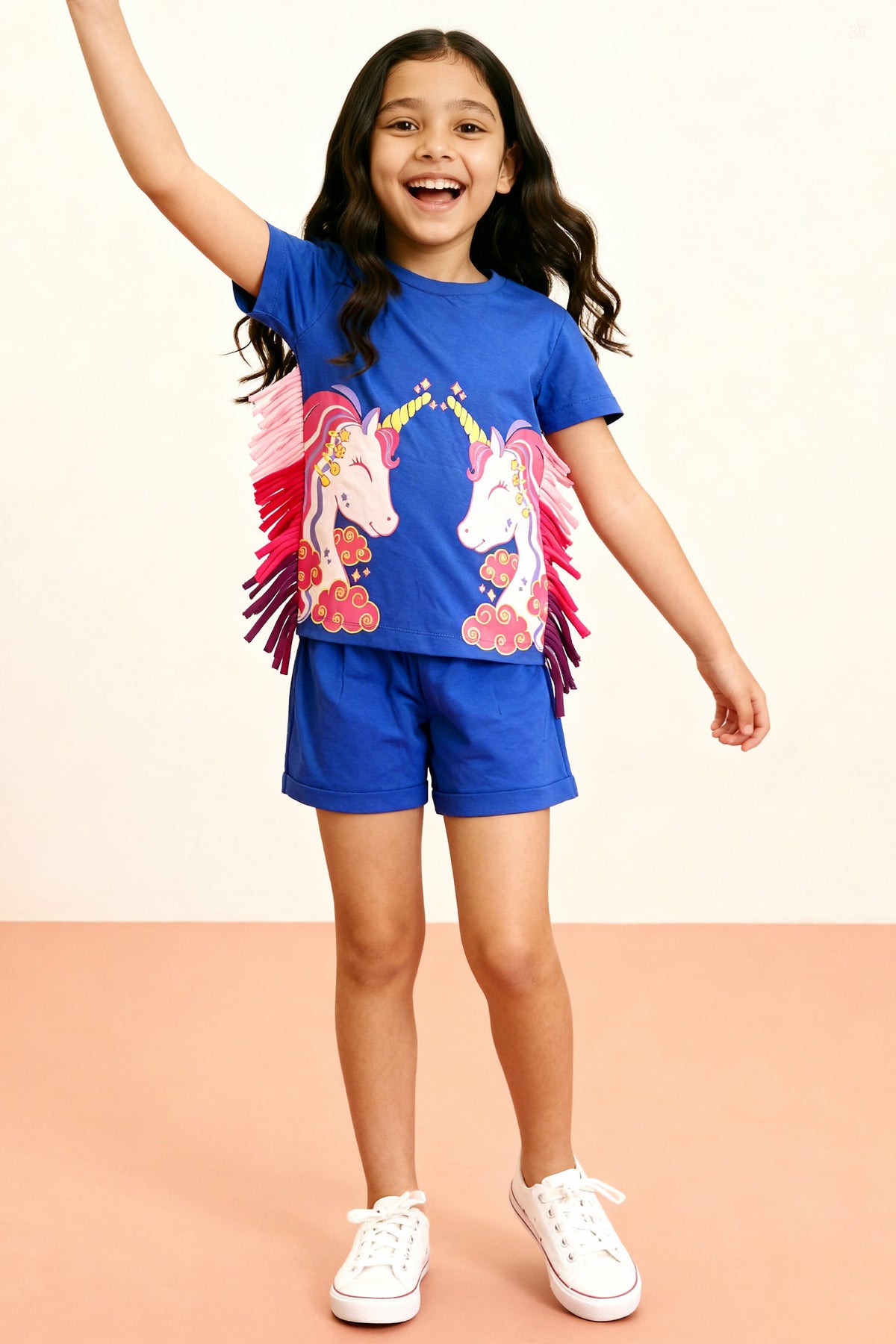 A young girl posing happily in Little Carrot Unicorn theme Set with Fringes