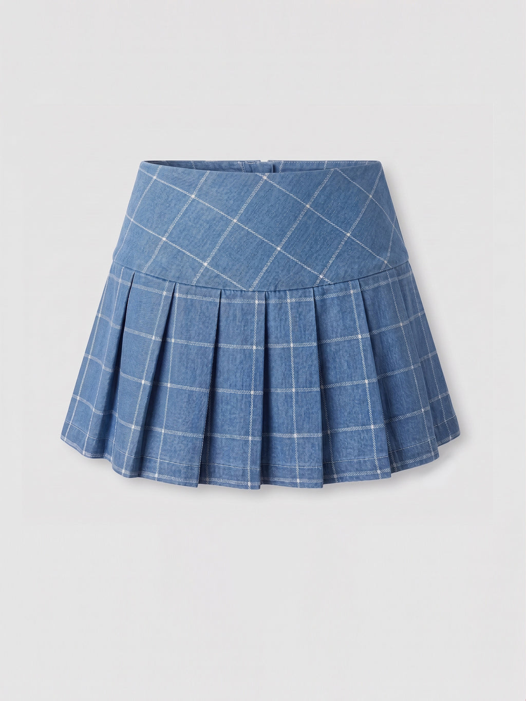A blue pleated mini skort with a white windowpane plaid pattern, shown flat against a light gray background.