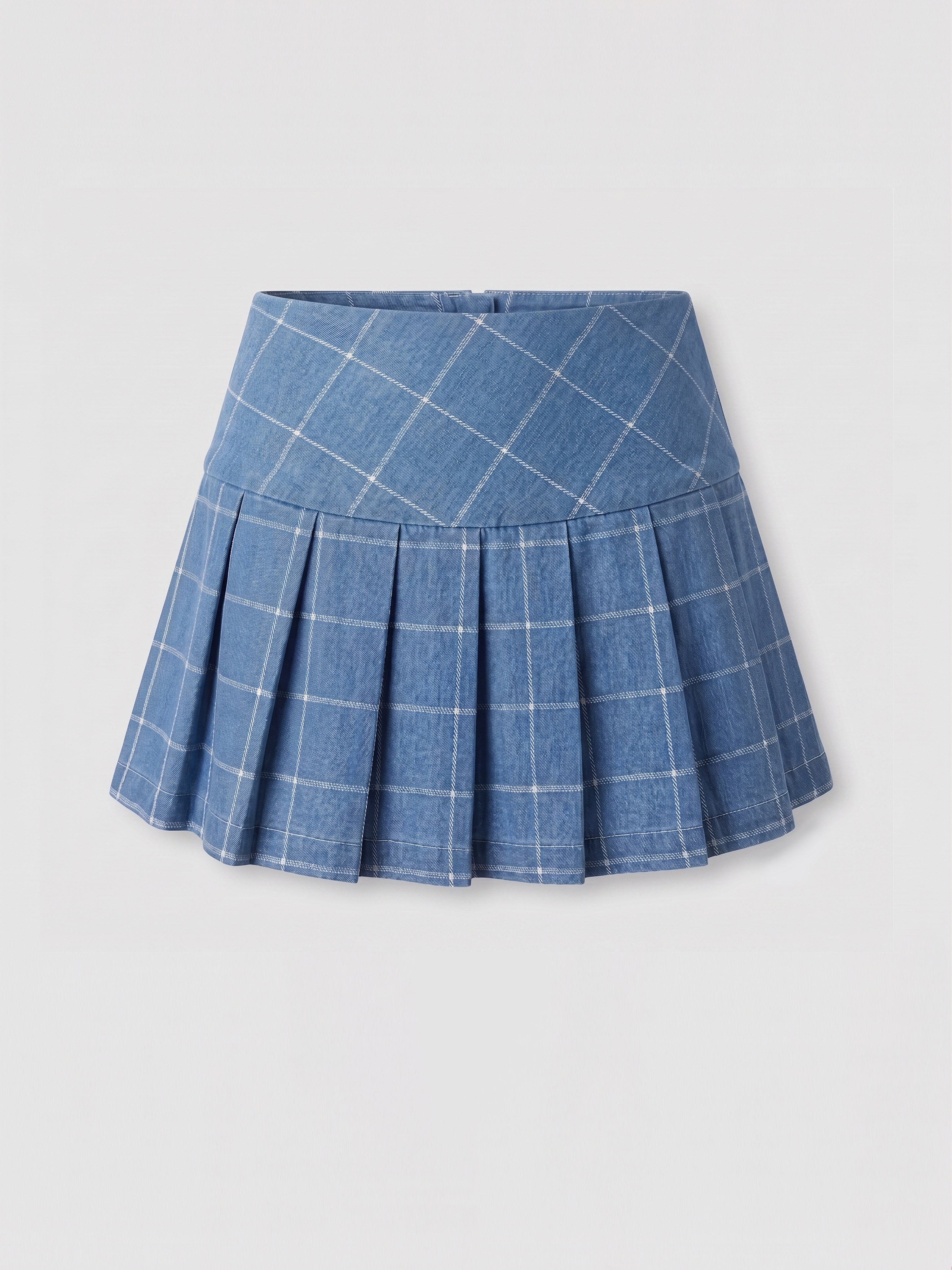 A blue pleated mini skort with a white windowpane plaid pattern, shown flat against a light gray background.
