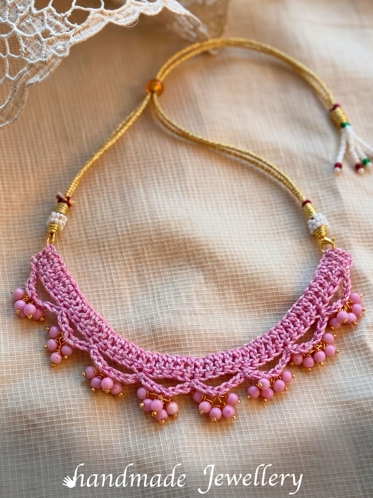 Detailing shoot of Little Carrot Handmade Crochet Lavender necklace