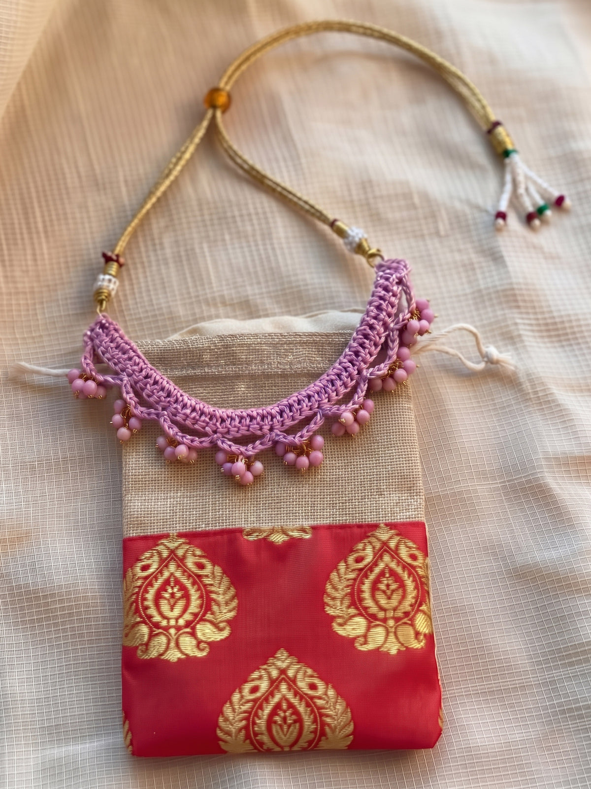 Detailing shoot of Little Carrot Handmade Crochet Lavender necklace