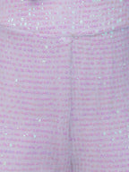 Close-up of a White rainbow sequin fabric with a subtle pattern