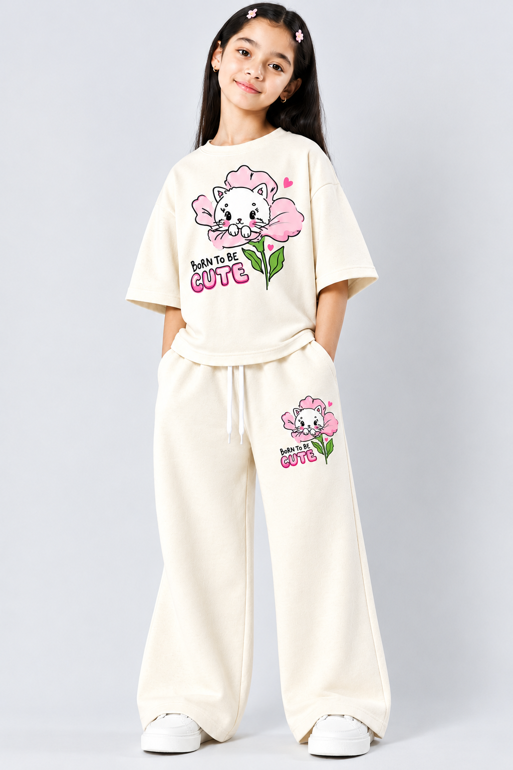 A Cute Girl posing in Off White Co-ord Set with cute Kitty Print, A style from Pink Skies Collection by Little Carrot