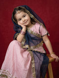 A young Girl posing in Baby Pink rajputi poshakh with contrast navy blue dupatta from Pink Skies collection by Little Carrot