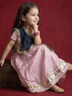 A young Girl posing in Baby Pink rajputi poshakh with contrast navy blue dupatta from Pink Skies collection by Little Carrot