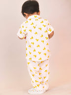 Unisex toddler wearing a soft double gauge cotton co-ord set with playful yellow bird print – comfy everyday outfit