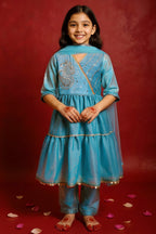 Girl wearing blue Anarkali kurta set with sequins, cord work, lace detailing, straight pants and dupatta by Little Carrot.