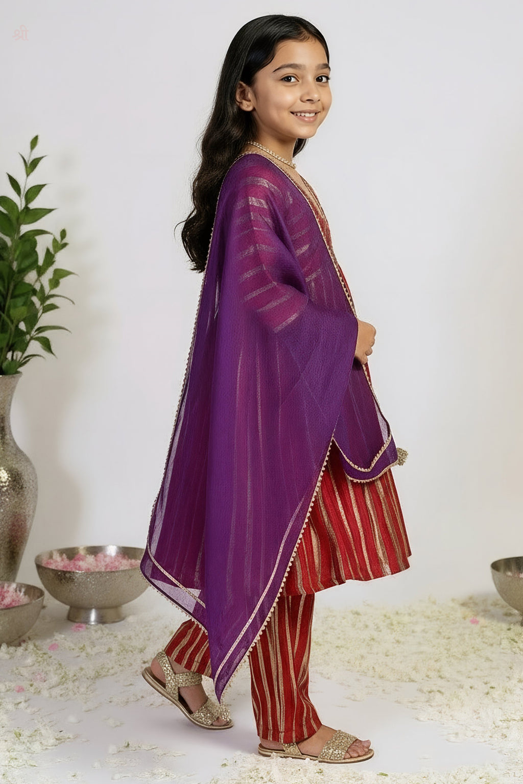 A Happy Girl wearing Little Carrot Gold Foil Printed Anarkali Kurti set with Dupatta