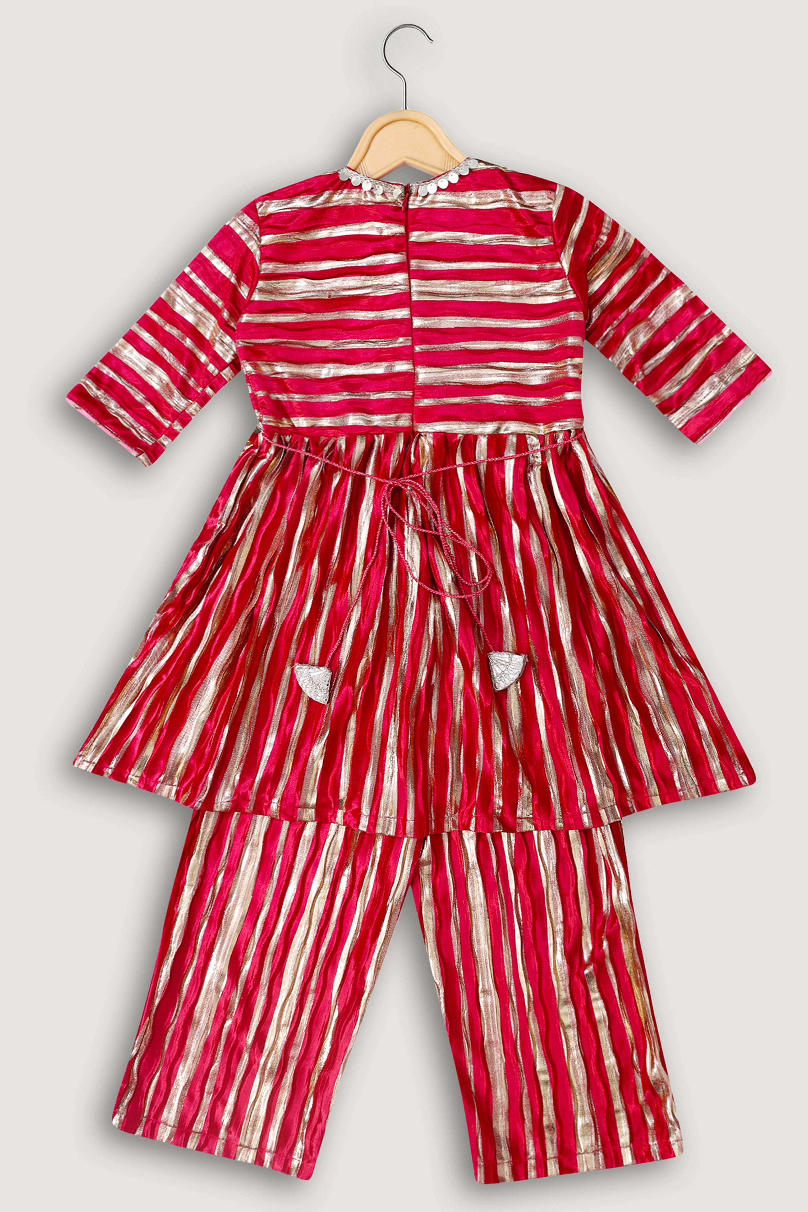 Red and white striped children's outfit on a hanger against a gray background