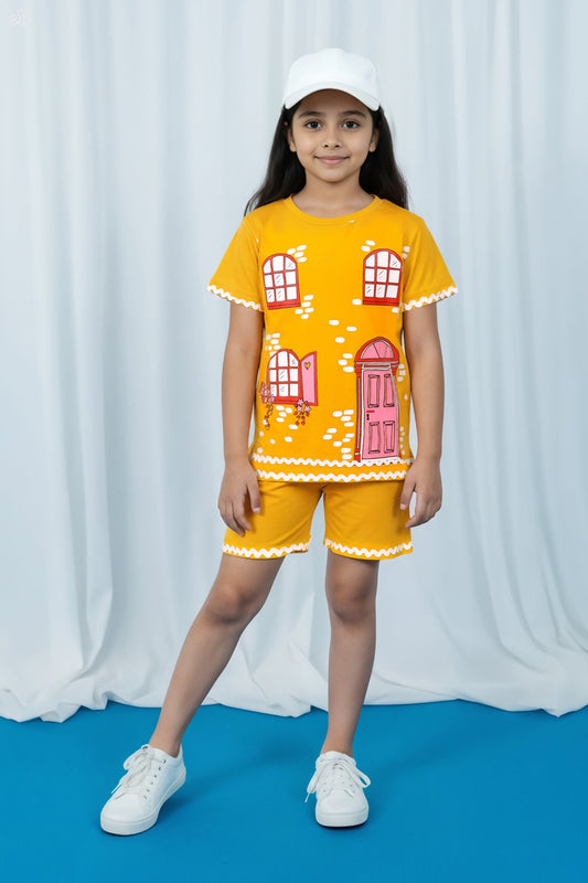 Little Carrot girls yellow printed cotton lounge co-ord set featuring playful house print and scalloped trims