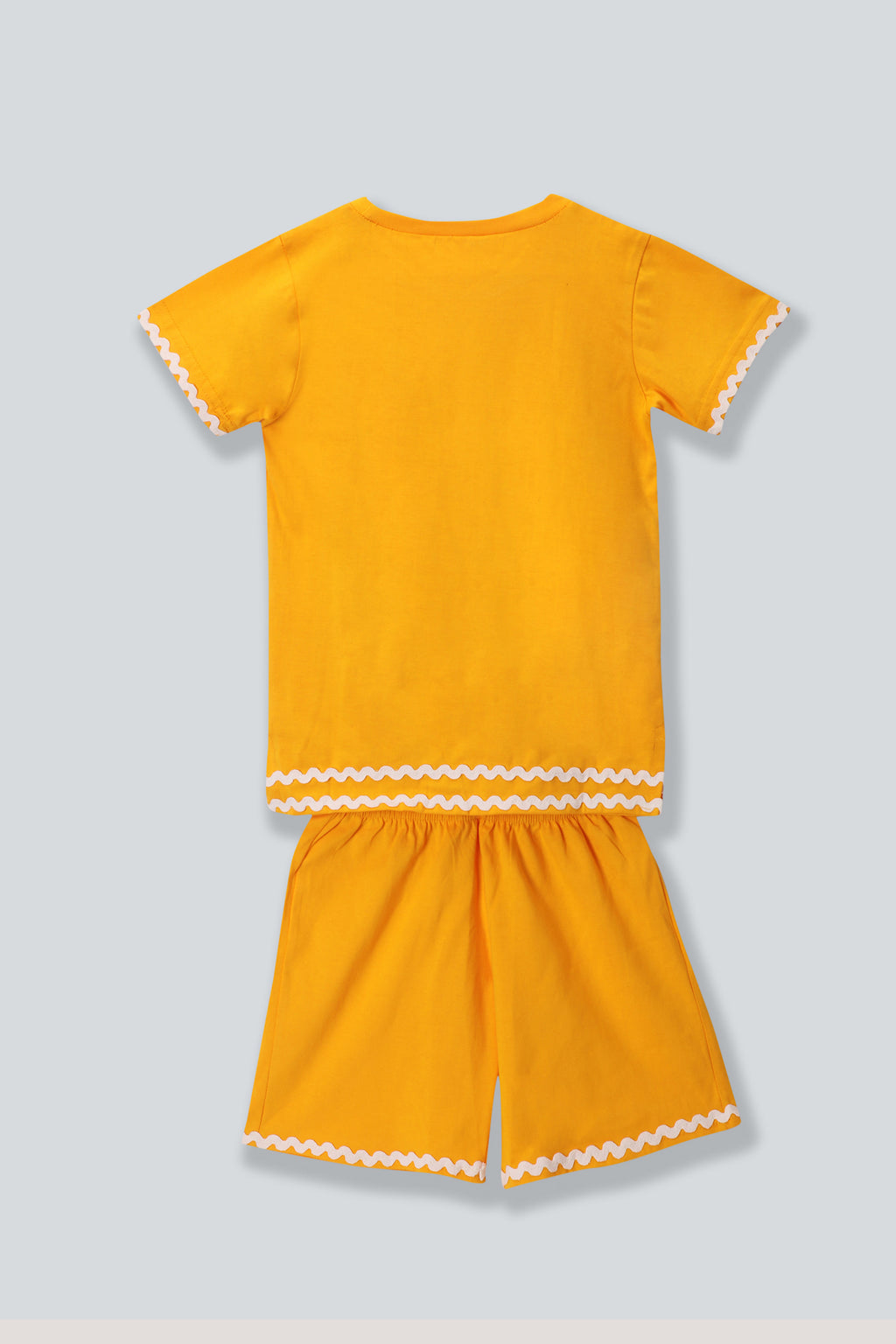 Little Carrot girls yellow printed cotton lounge co-ord set featuring playful house print and scalloped trims