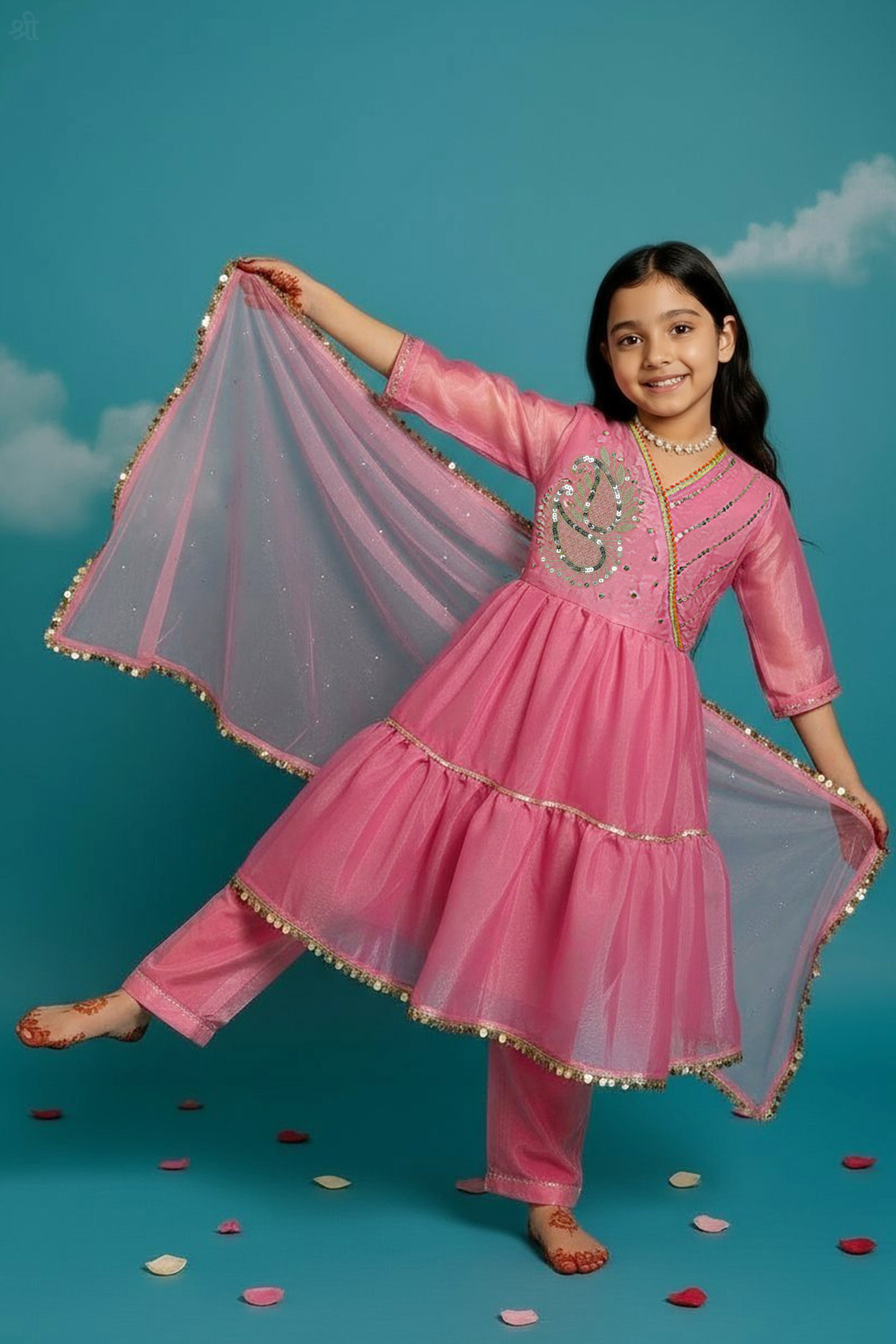 Girl wearing pink Anarkali kurta set with sequins, cord work, lace detailing, straight pants and dupatta by Little Carrot.